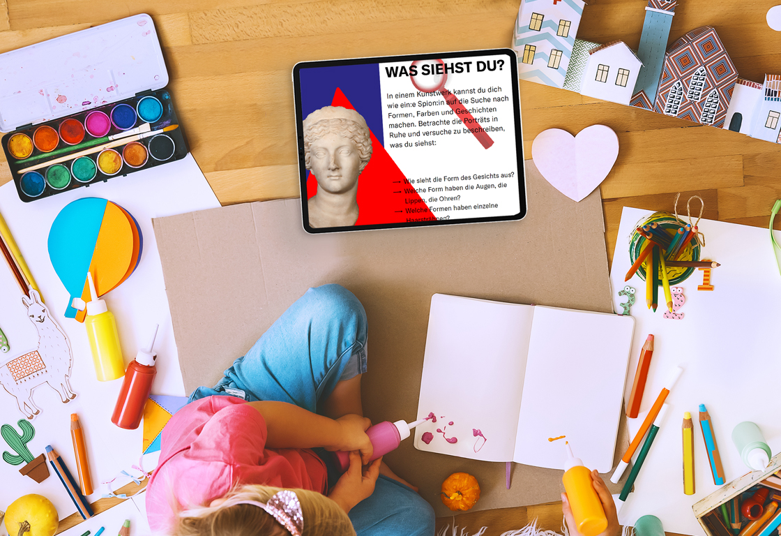 Schreibtischansicht mit digitalen Bastelanleitung zu Augustus
